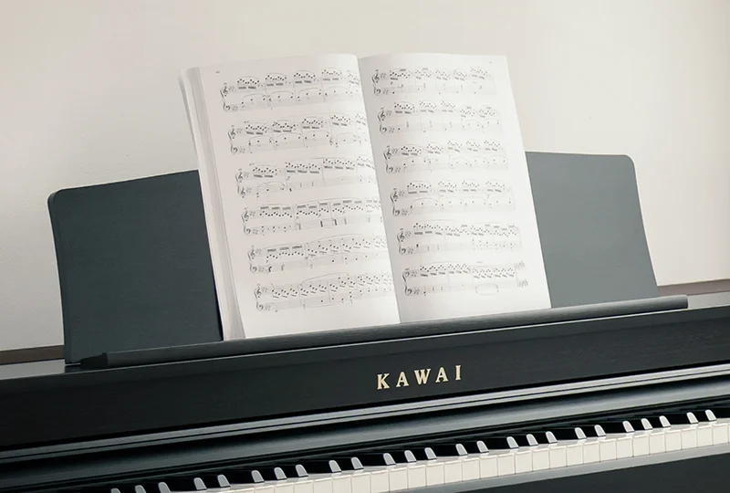 Broad, adjustable music rest