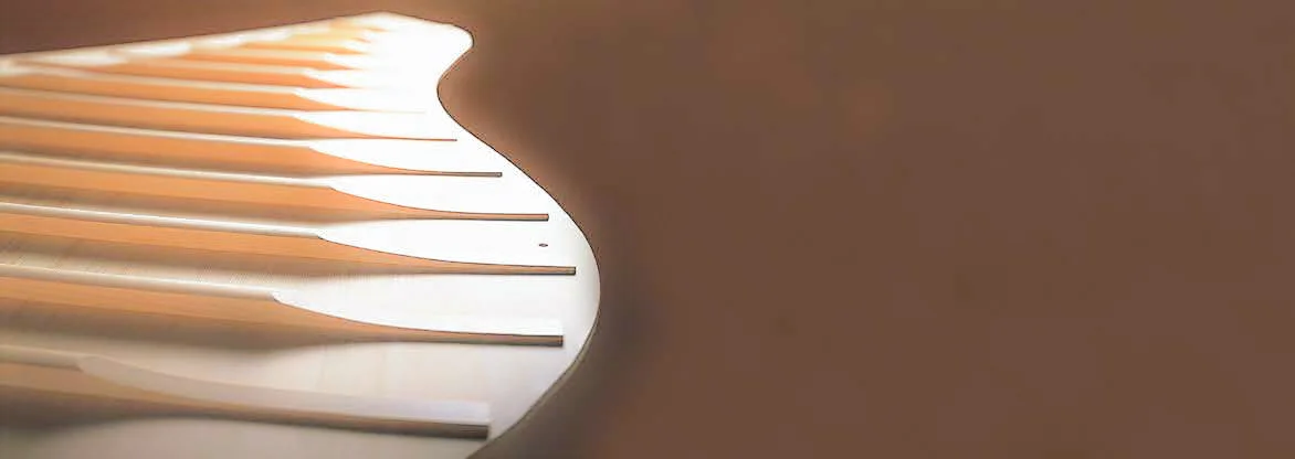 Tapered soundboard made of solid spruce