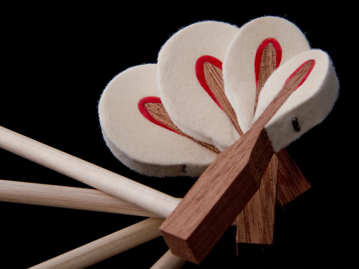 Mahogany wood core & T-stapled, double felted hammers