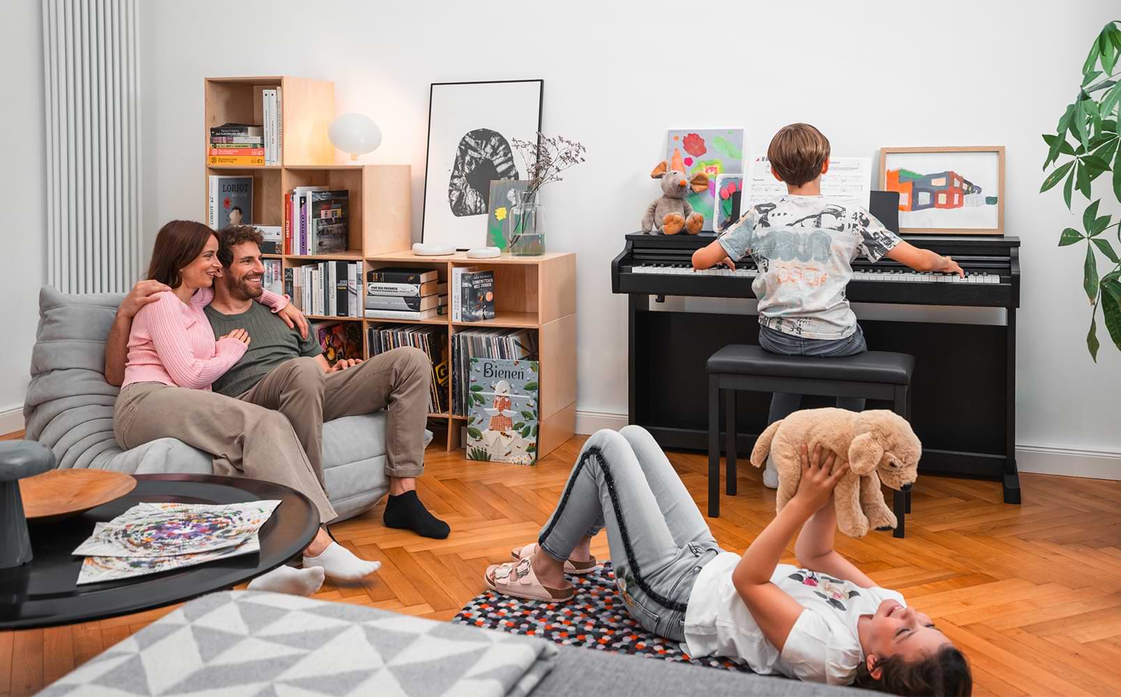 A family enjoying the CX202 digital piano
